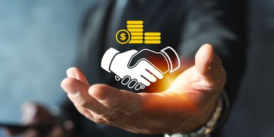 Hand presenting handshake and money icons symbolizing business deal.