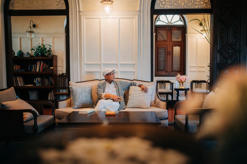 Solo traveler unwinding in elegant resort interior