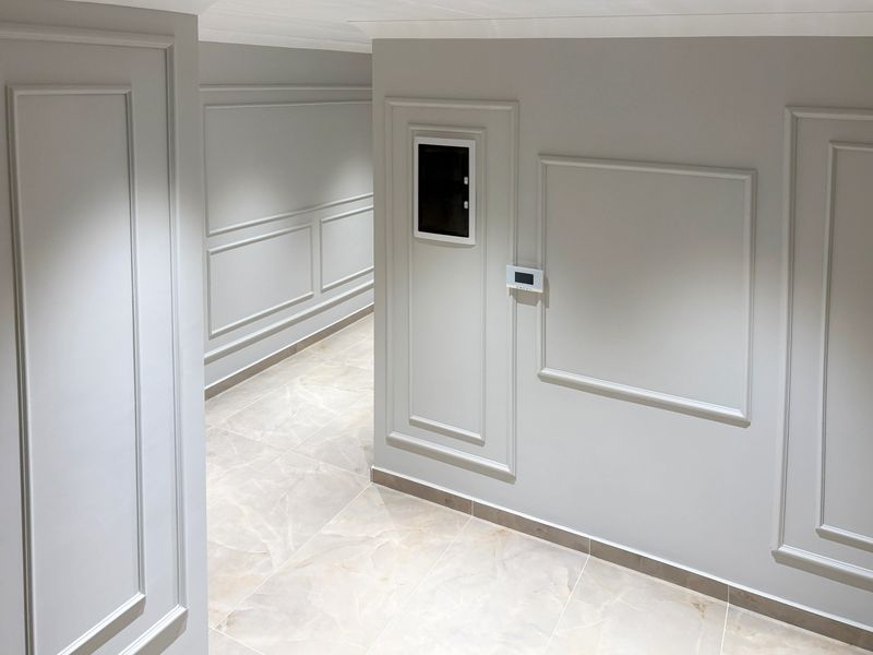 Home showcase interior. Modern house lobby. Wall decoration and tiled floor. Building entrance. Entrance hall