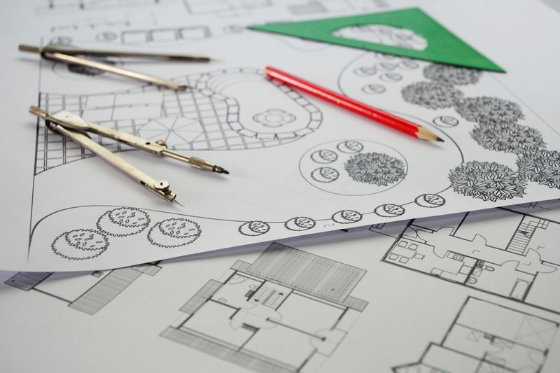 Architectural Landscape Design Blueprint with Drafting Tools