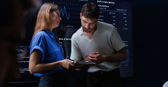 Person using a laptop with virtual file management and cloud server interface.