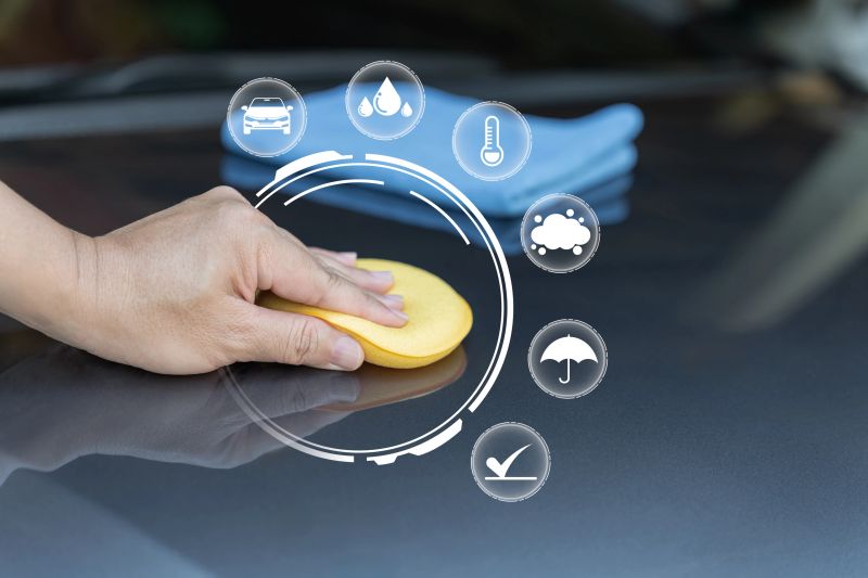 Car Paint Basic Protection Concept, Close Up Hand a Man Applying Wax with Sponge, Automotive Surface Care, DIY Car Detailing, Protecting Vehicle Paint from Dust, Rain and Environmental Damage