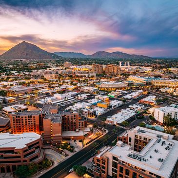 Camelback Mountain and Scottsdale, Arizona at sunset.