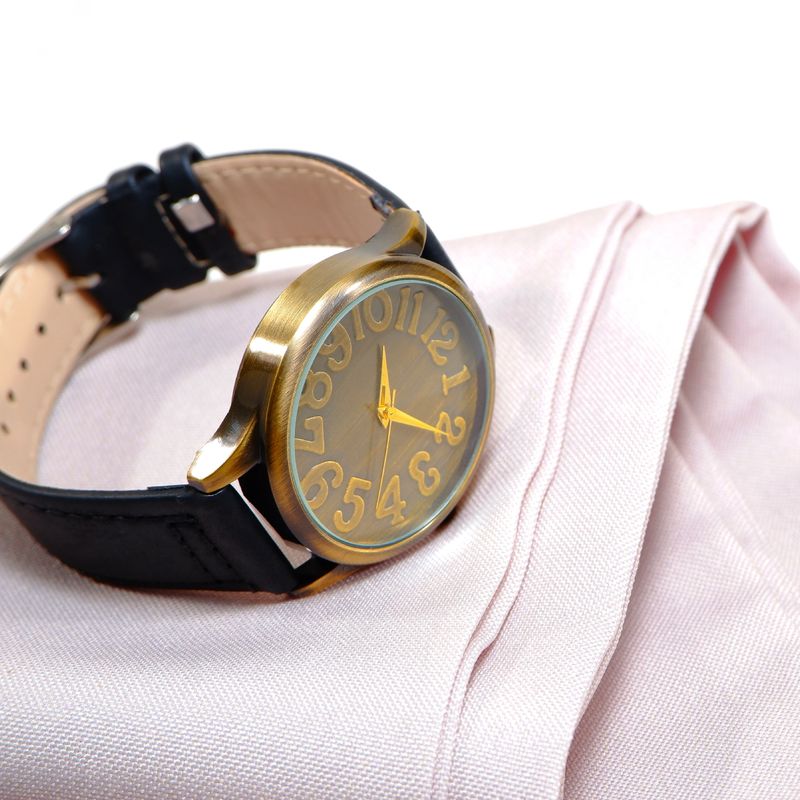 Elegant wrist watch with a sleek black leather strap isolated on white background, exuding elegance and sophistication. The perfect accessory for those who appreciate fine timepieces and stylish details.