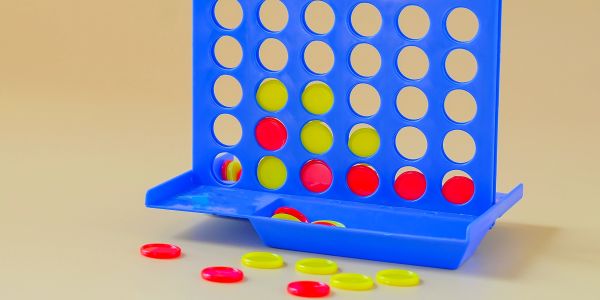 A Connect Four game with red and yellow pieces.