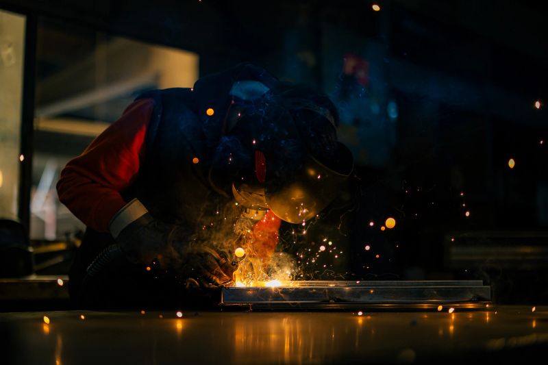 welder, craftsman, erecting technical steel Industrial steel welder in factory