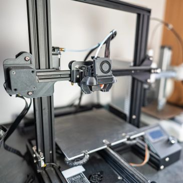 Imprimante 3D en cours d'utilisation.