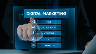 Hand interacting with digital marketing interface on transparent screen.