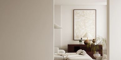 Minimalist living room with neutral tones and modern decor.