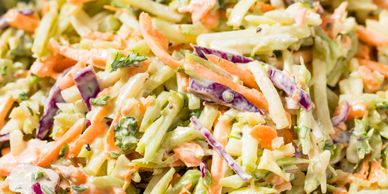 Fresh coleslaw salad with carrots and cabbage.
