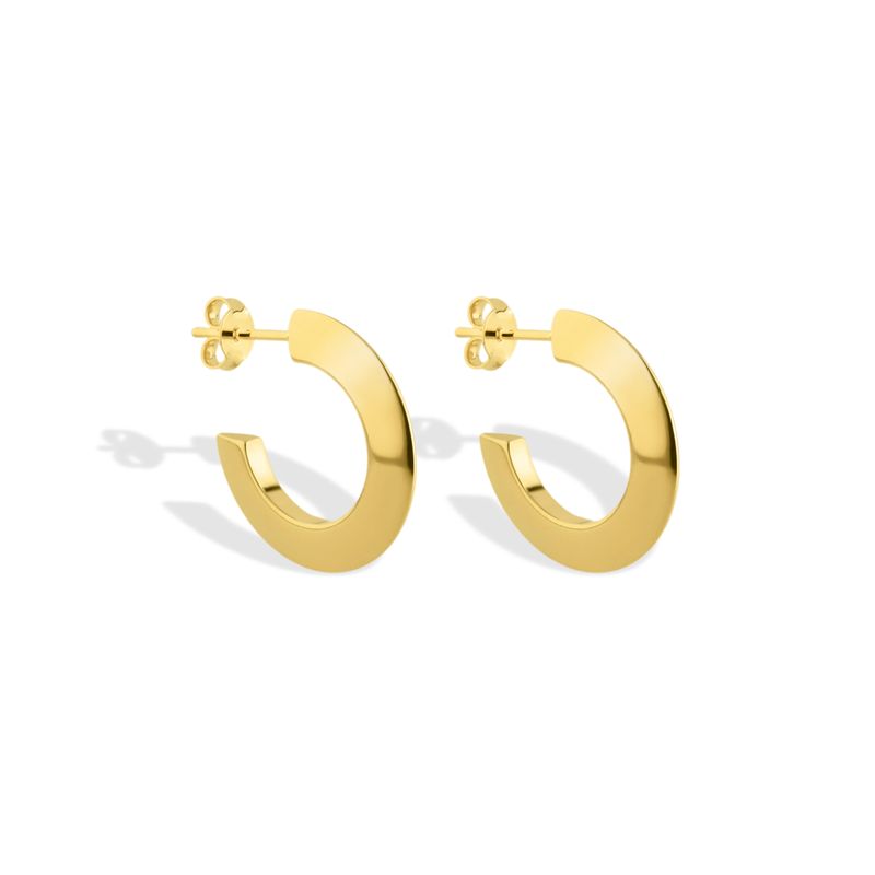 Pair of elegant yellow gold hoop earrings. Classic and versatile design perfect for everyday wear or special occasions. Timeless jewelry pieces that add a touch of sophistication to any look.