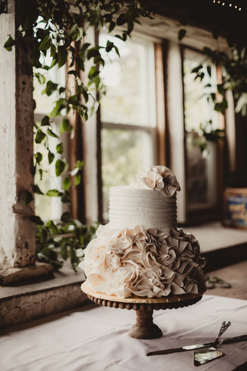 Beige and white ruffle style wedding cake