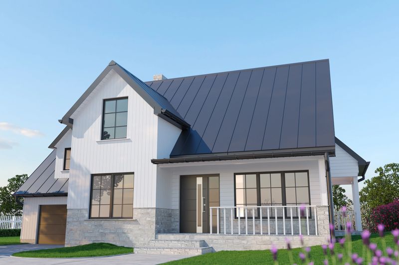 3D illustration of a white modern American single-family house exterior. Contemporary residential building with wooden elements, metal gable roof, garage, front porch and landscaped garden. Suburban home architecture concept suitable for real estate, housing, construction and property design.