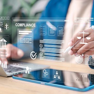 Person interacting with digital compliance interface on a tablet.