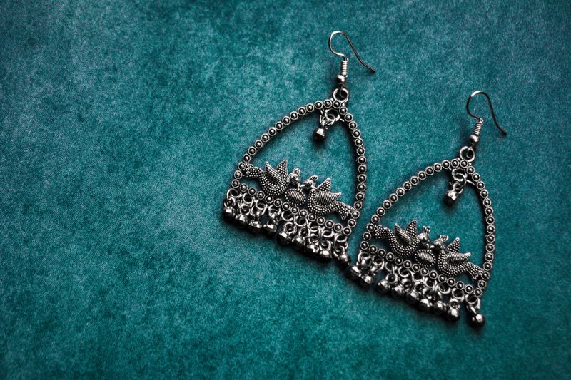 Traditional indian earrings with peacock design