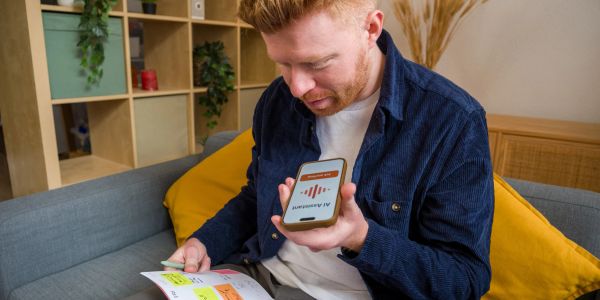 Man using a smoking cessation app on his phone.