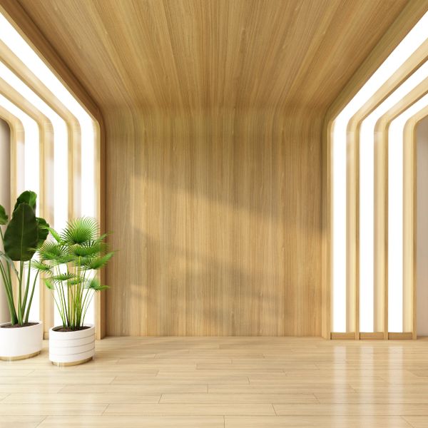 Modern wooden wall with vertical lighting and green plants.