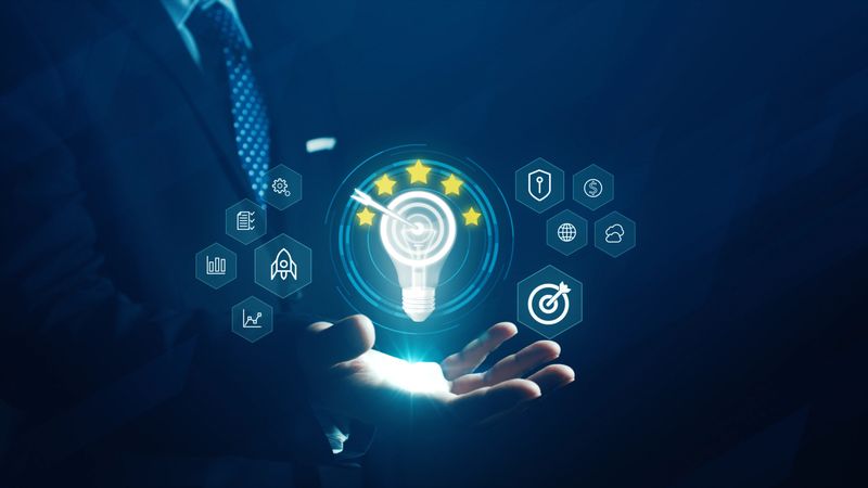 Creative idea and innovation concept with businessman holding light bulb target icon, representing business strategy and goal achievement. Business and technology background 3D rendering