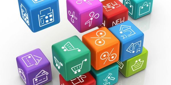 Colorful cubes with shopping and discount icons symbolizing e-commerce.