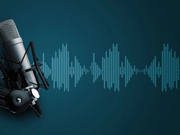 A microphone with sound wave graphics on a dark blue background.