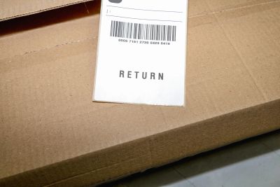 Cardboard box with a return label.