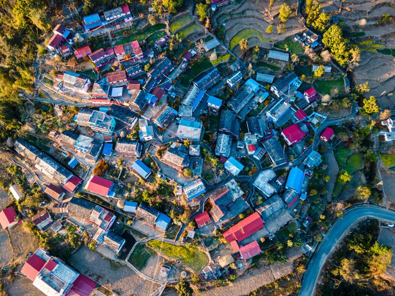 The aerial view shows the traditional Gurung mountain village of Sirubari in Syangja, Nepal