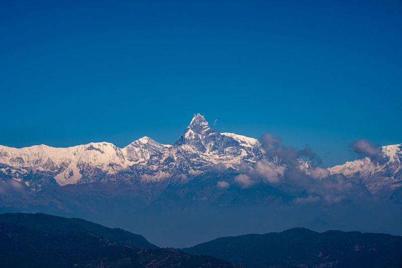 Morning view of the shining Machhapuchre  range from Mhaju Bhanjyang Hill in Syangja, Nepal.