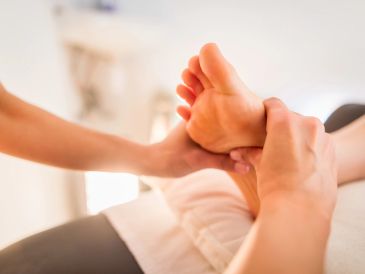 Person receiving a foot massage.