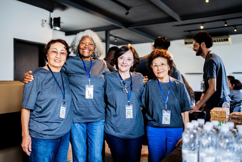 Portrait of a volunteers embracing during community outreach