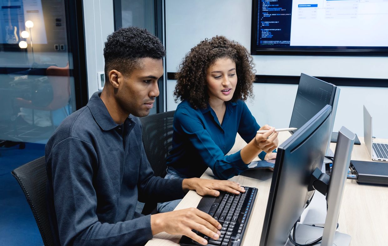 A split image showing a hacker and a businessman with digital symbols and dollar signs.