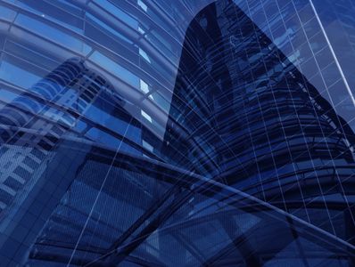 Abstract reflection of modern skyscrapers in glass surfaces.