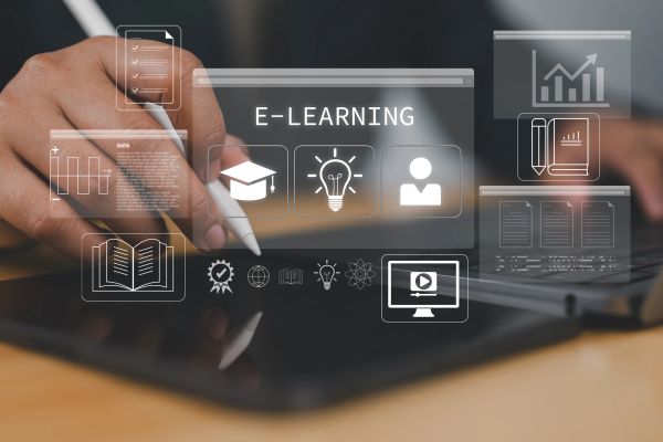 Person using tablet for e-learning with digital icons.