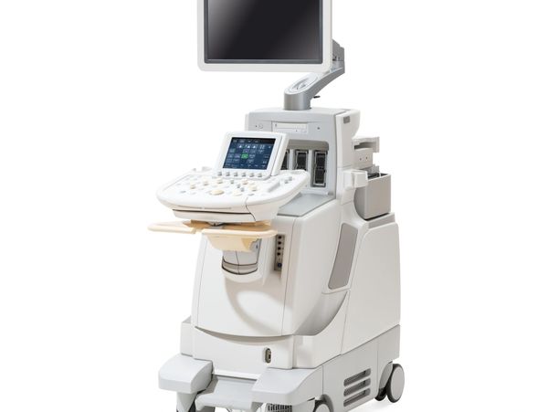 Modern medical ultrasound machine with monitor and control panel on wheels.