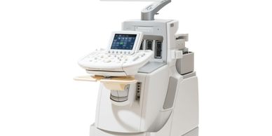 Modern medical ultrasound machine with display and control panel.
