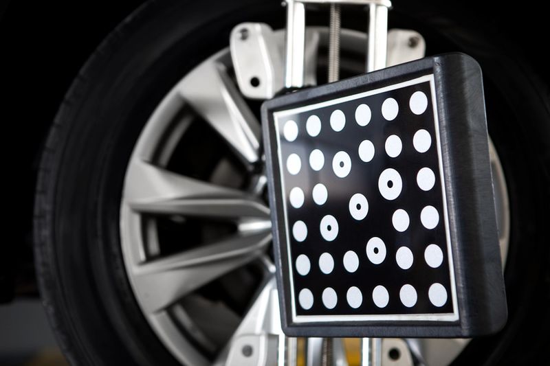 Alignment and balancing car tires using professional technological tools on a computer - Buenos Aires - Argentina