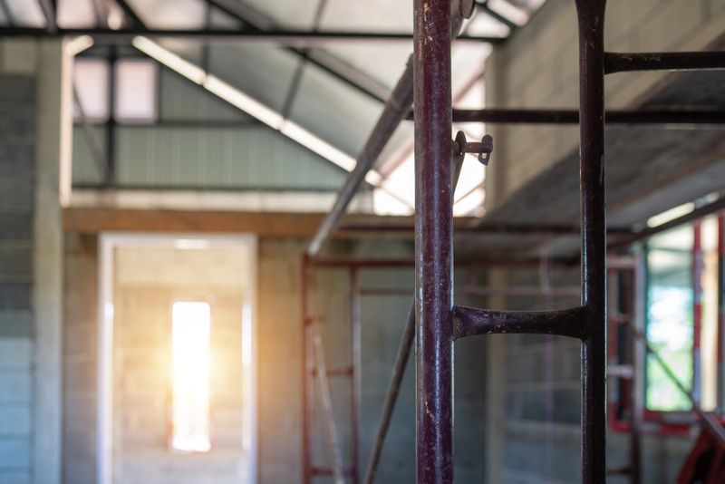 Showcasing the inner workings of a construction site emphasizing the structural elements and progress made.