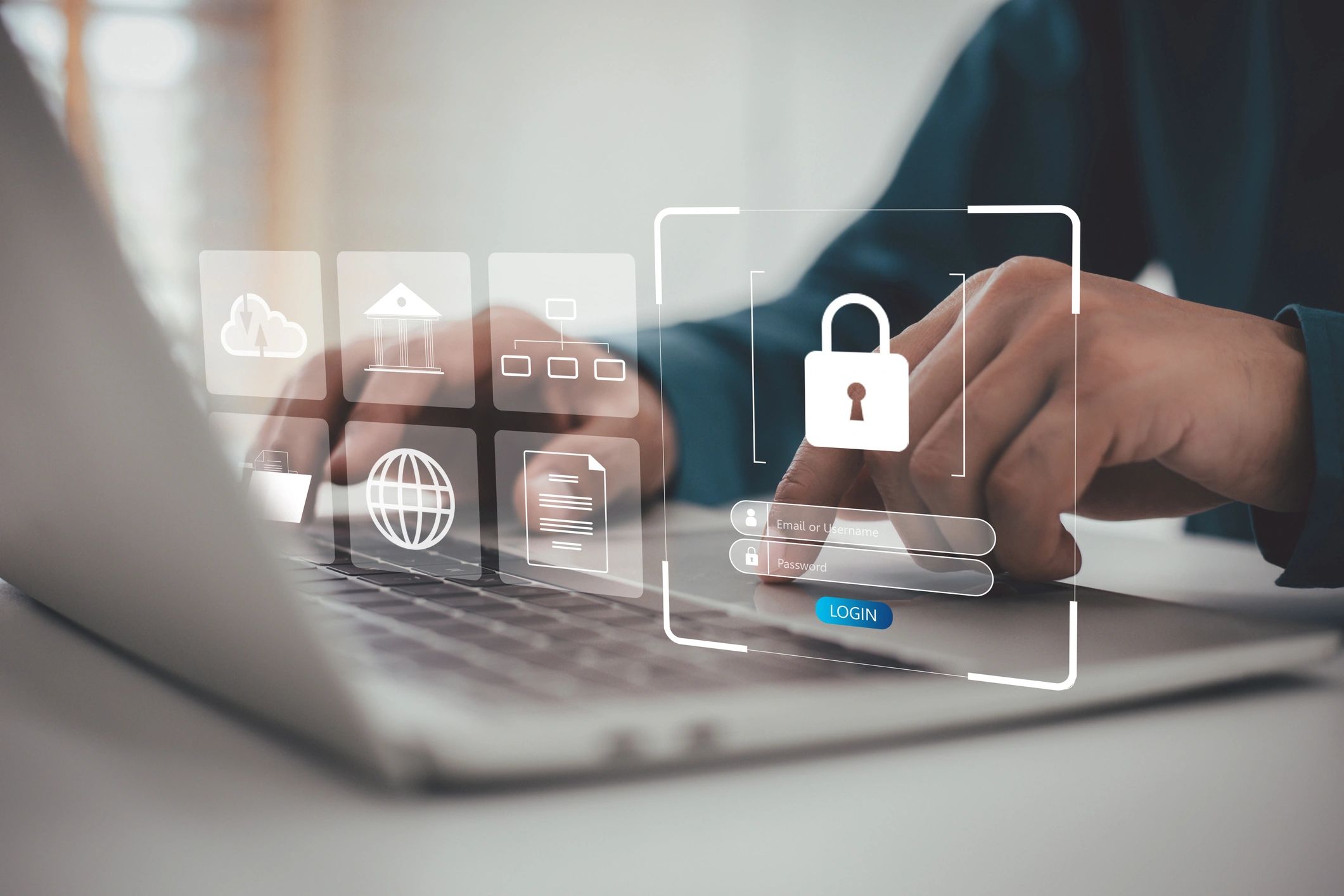 Person logging into a secure system on a laptop.