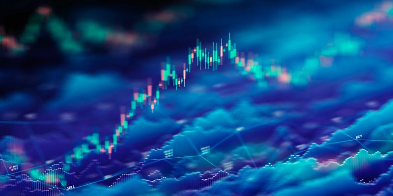 Dynamic abstract image of financial data and stock market analysis, featuring colorful candlestick charts and digital data graphs in a futuristic blue-toned background. Represents investment trends, trading strategies, and financial technology concepts.