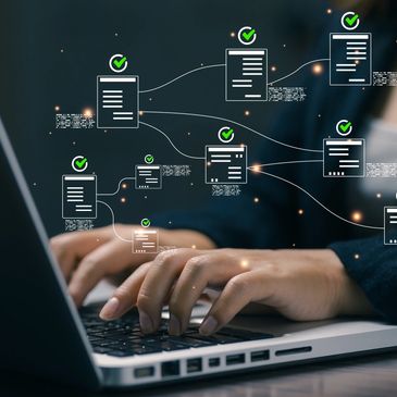 Hands typing on laptop with digital checklist overlays.