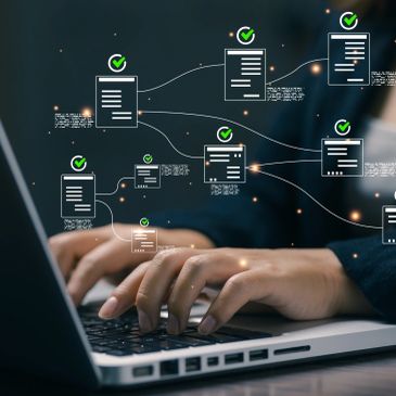 Hands typing on laptop with digital checklist overlays.