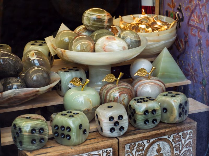 Decorative Stone Dice and Ornaments on Display