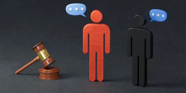 Two figures with speech bubbles and a judge's gavel.