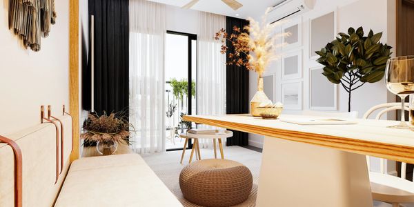 Bright, modern dining area with natural decor and large windows.
