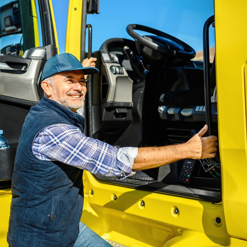 Mature truck driver preparing to hit the road