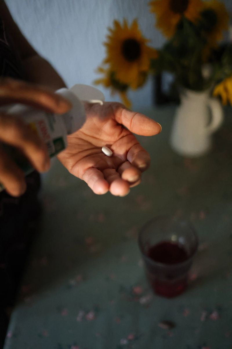 Joint health capsule in hand, promoting mobility and active living. Ideal for healthy lifestyle, fitness and wellbeing concept.