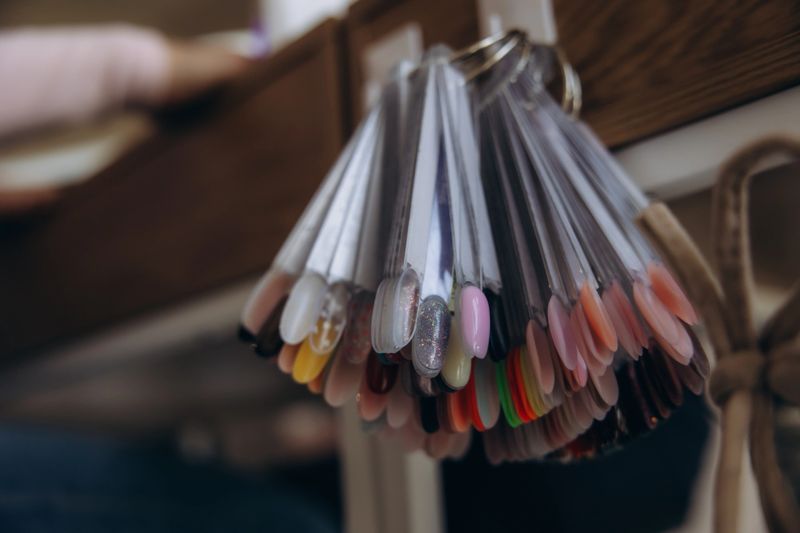 Nail polish samples showing a wide range of colors for manicure and pedicure services at a professional beauty salon