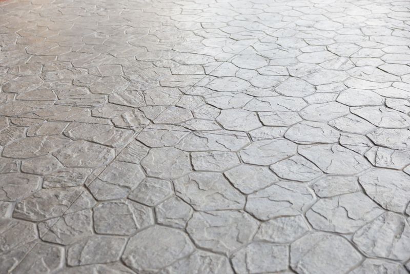 grey stamping concrete floor. pattern exterior cement flooring.