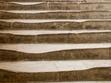 Close-up of old stone stairs.
