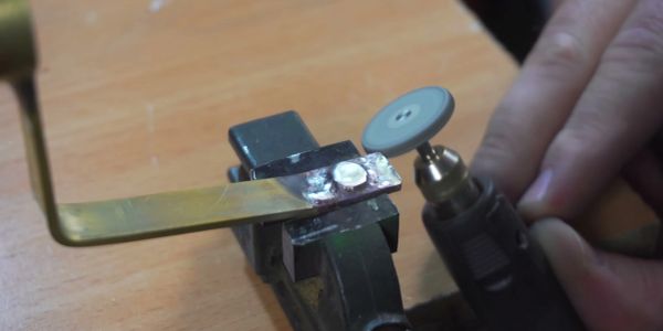 Metal polishing with a rotary tool.