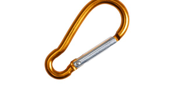 Orange metal carabiner with a silver gate on white background.